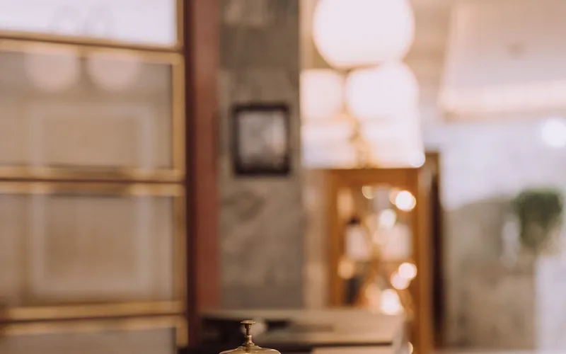 Warm hotel front desk and lobby kept guest-ready around the clock
