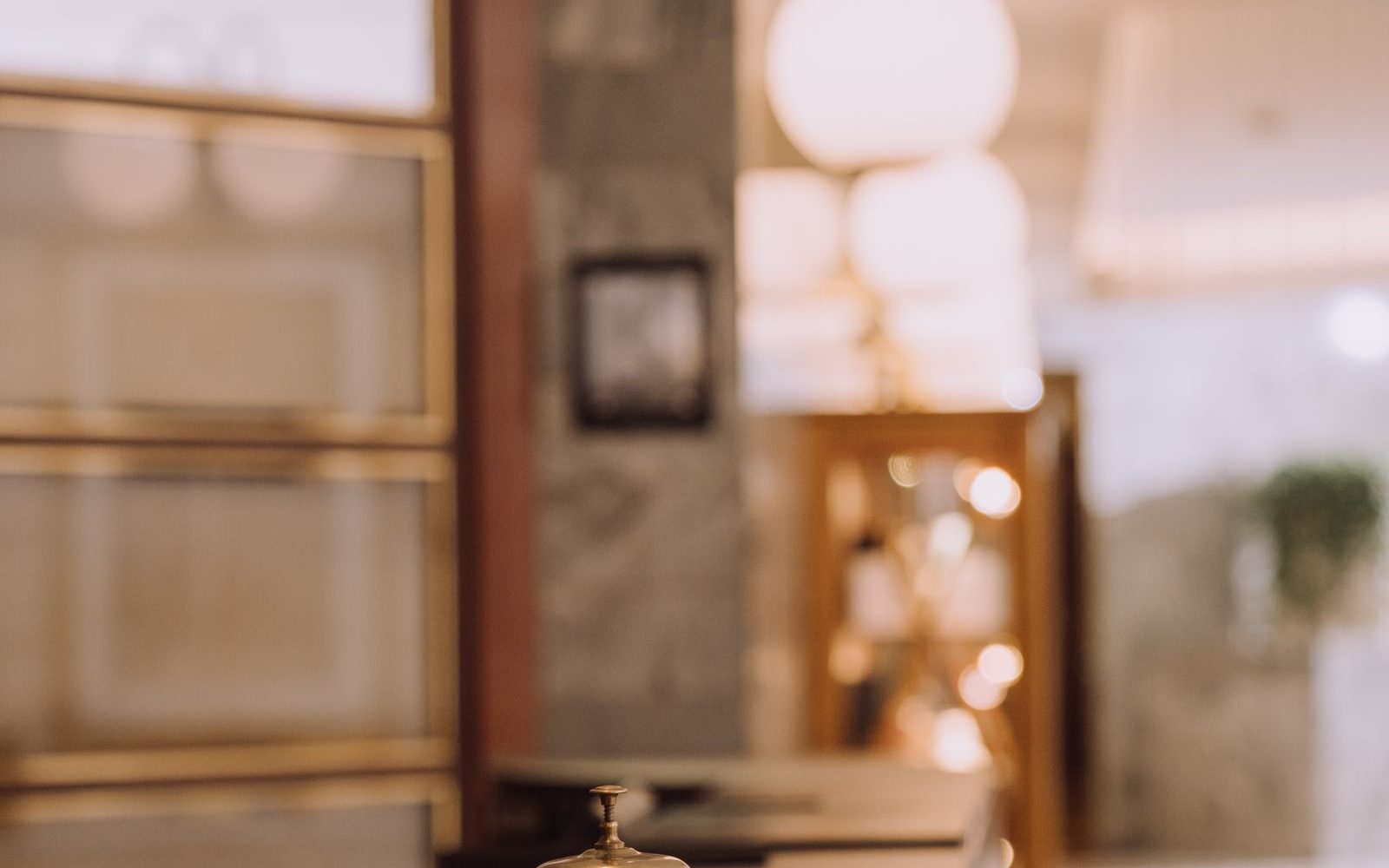 Warm hotel front desk and lobby kept guest-ready around the clock