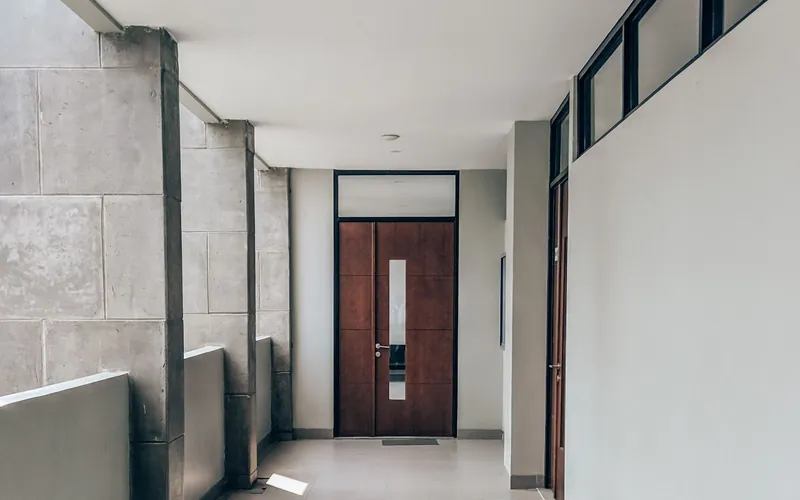 Bright, spotless commercial building hallway maintained by a day porter