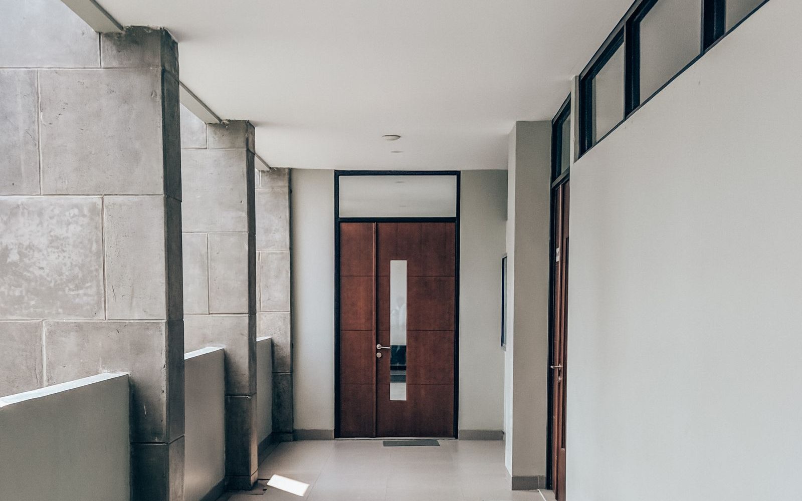 Bright, spotless commercial building hallway maintained by a day porter